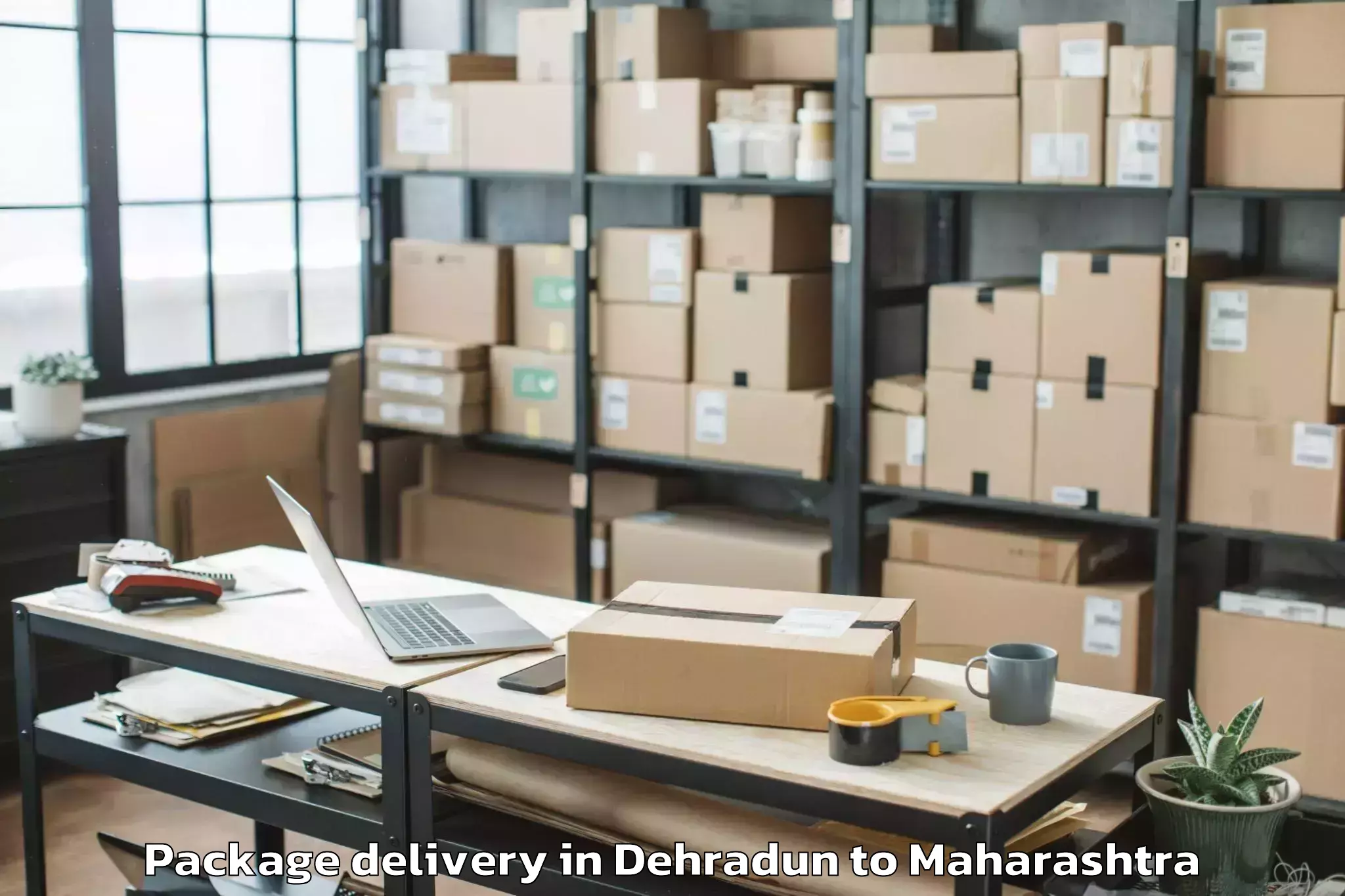 Reliable Dehradun to Tirora Package Delivery